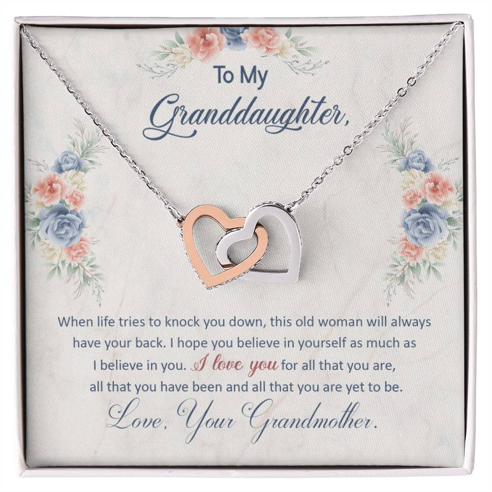 Silver heart pendant necklace in a floral gift box with printed message for granddaughter
