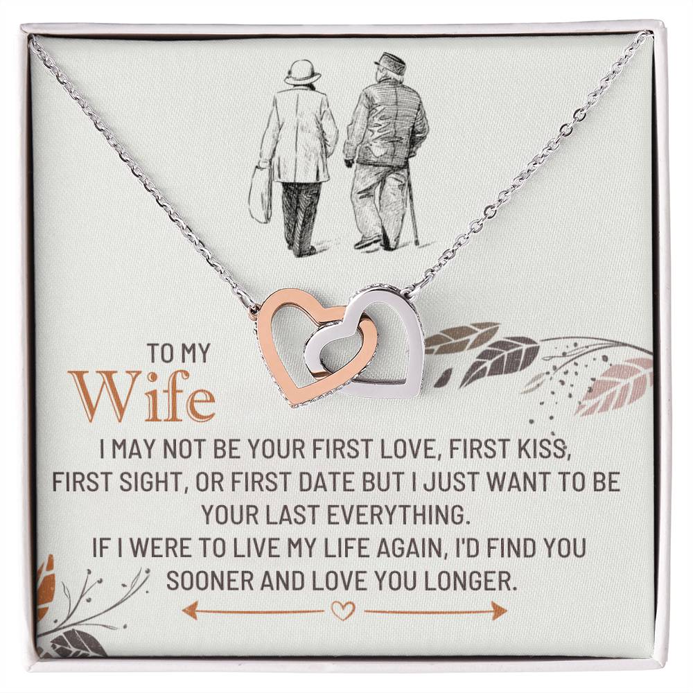 Silver-toned heart pendant necklace in a gift box with printed message and figures