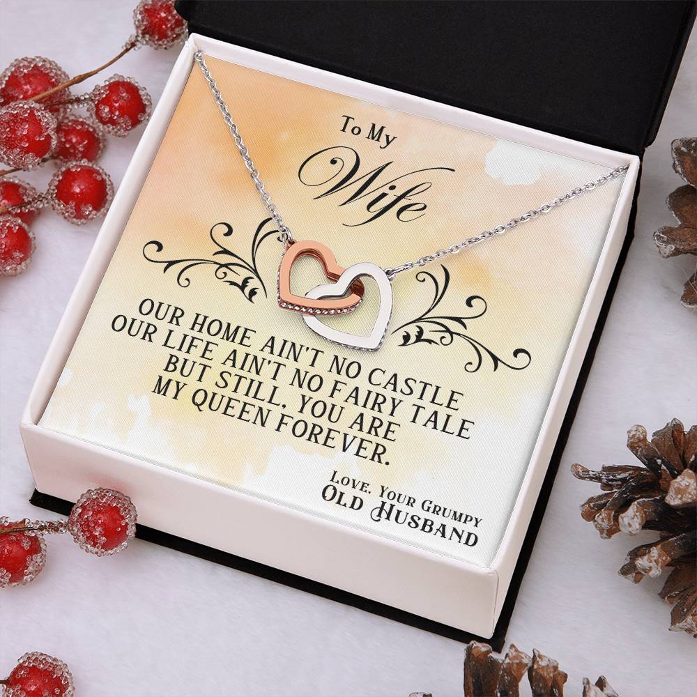 Heart pendant necklace with rose-and-silver hearts in an open gift box for wife