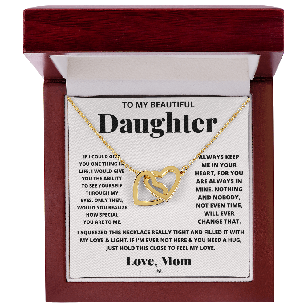 Daughter heart necklace in gold-tone with heart pendant in a red gift box.