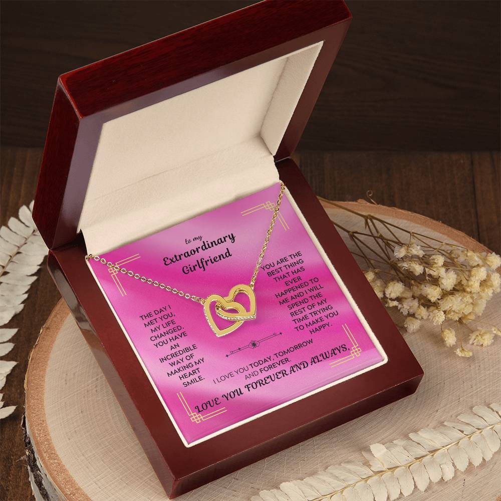 Rose-gold tone interlocking hearts pendant necklace in a gift box