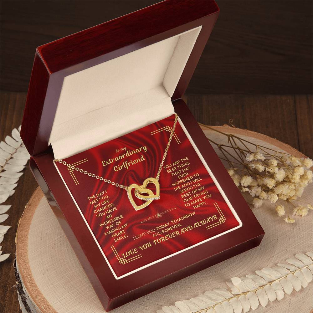 Interlocking hearts necklace pendant on chain in red gift presentation box