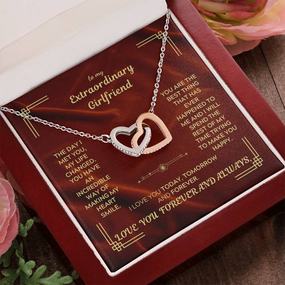 Interlocking hearts necklace with heart pendant and linked chain in a gift box