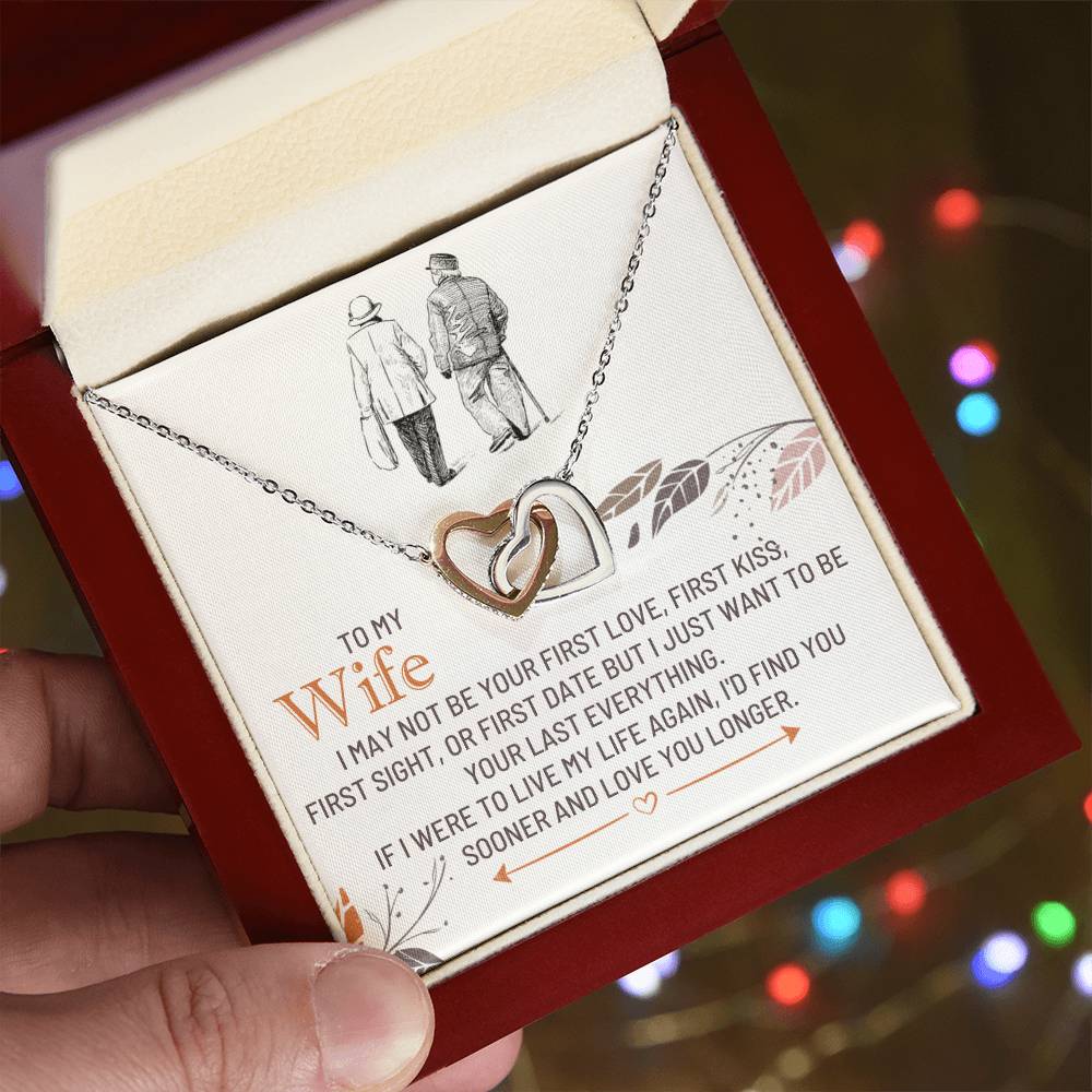 Heart pendant necklace inside a gift box, silver-toned chain and heart charm