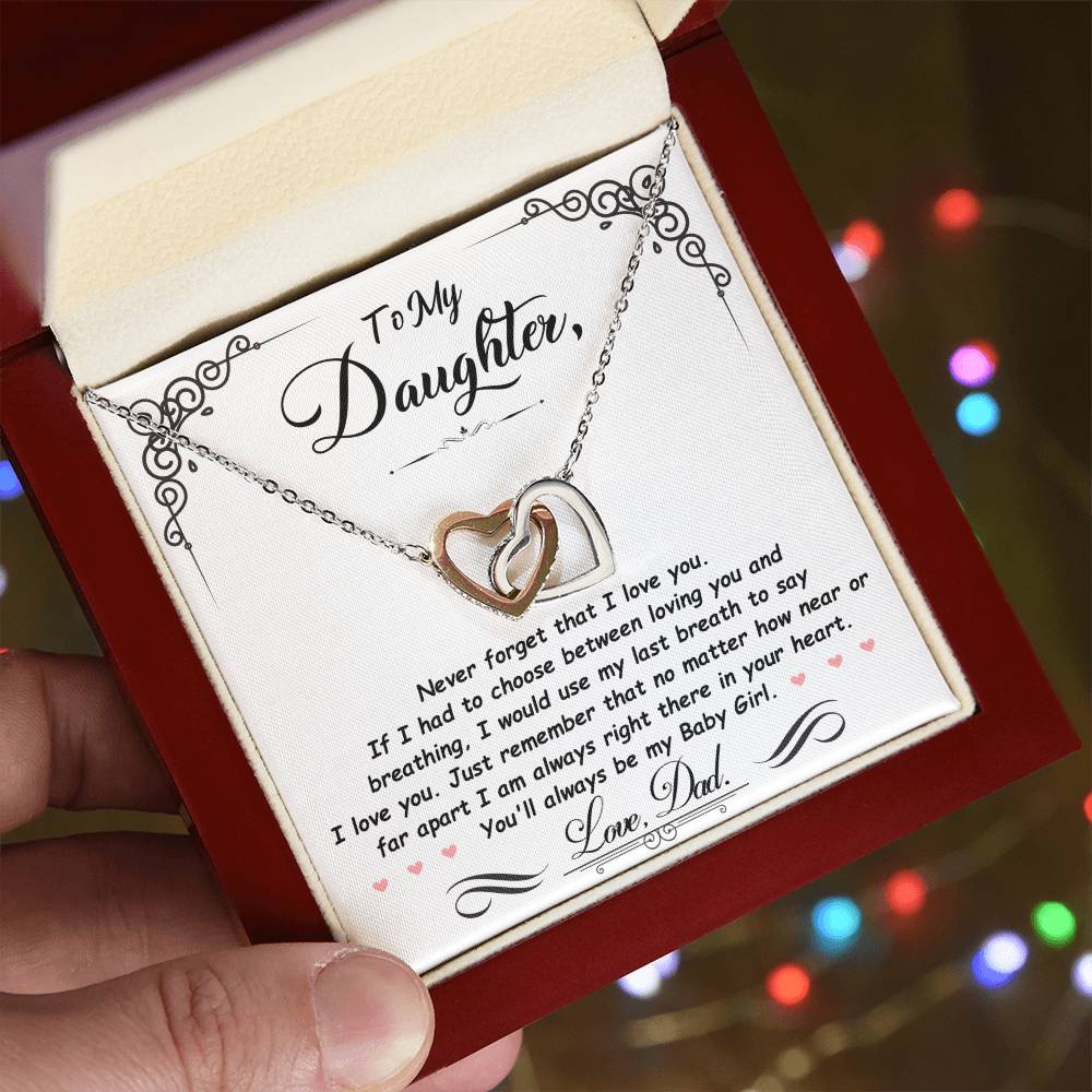 Silver-tone heart pendant necklace displayed in a gift box with engraved message