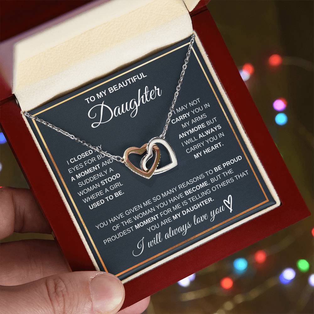 Heart pendant necklace with rose gold heart charm on silver chain, gift box view