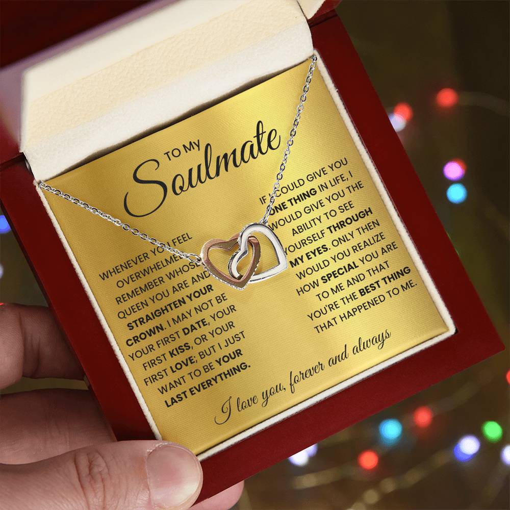 Heart pendant necklace with a heart charm, shown resting in a gift box