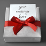 Personalized gift wrap with red ribbon bow and card reading 'your message here'.