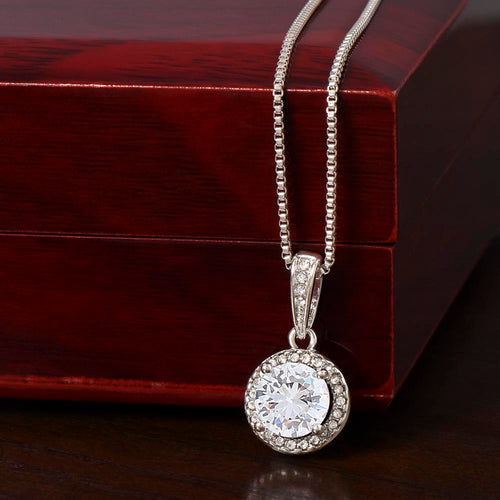 Silver-tone round halo pendant necklace with cubic zirconia center on link chain