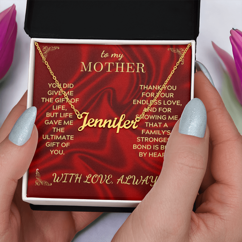 Personalized name necklace with Jennifer pendant and gold-tone chain in gift box, held