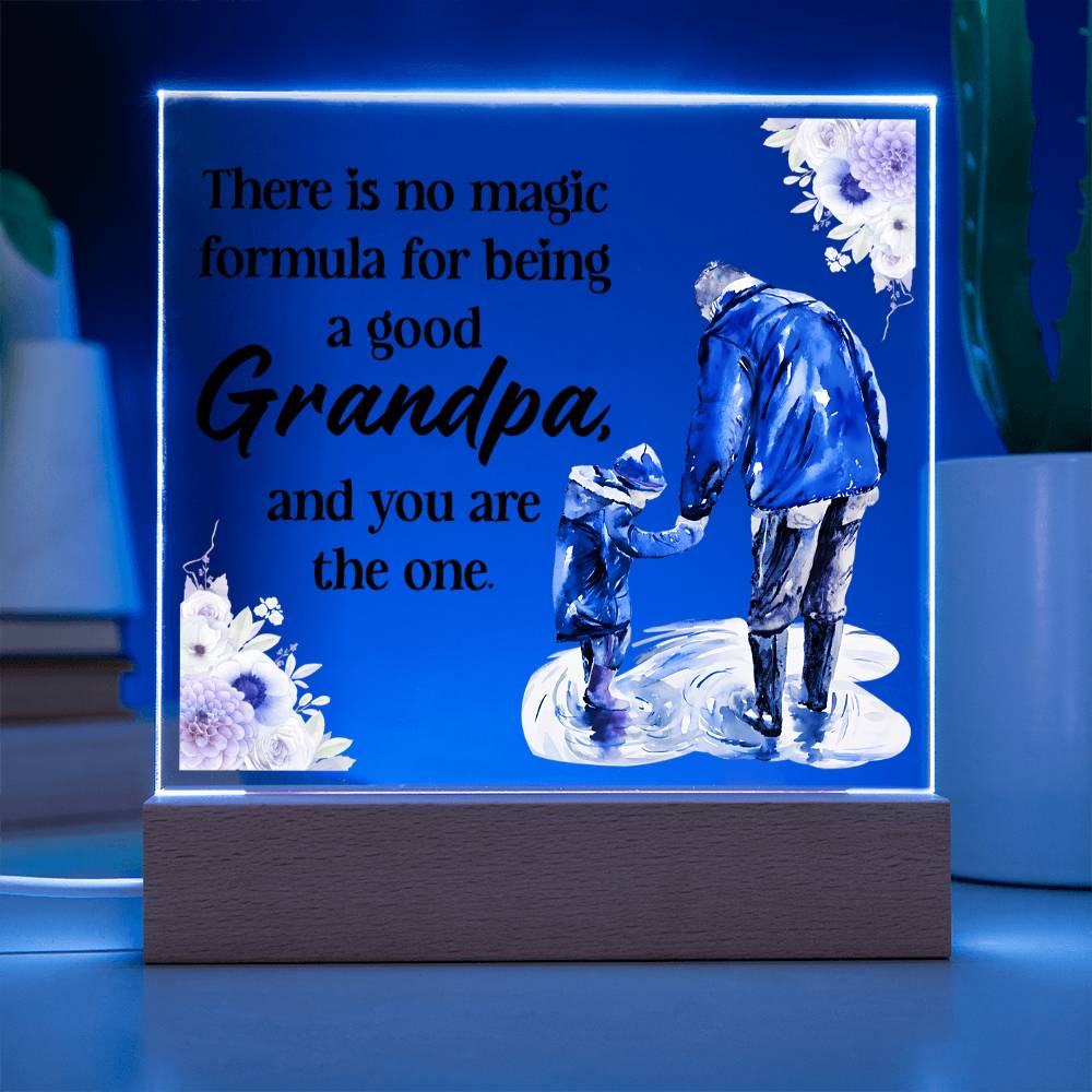 Blue-lit square acrylic LED plaque showing Grandpa and grandson on a wood base