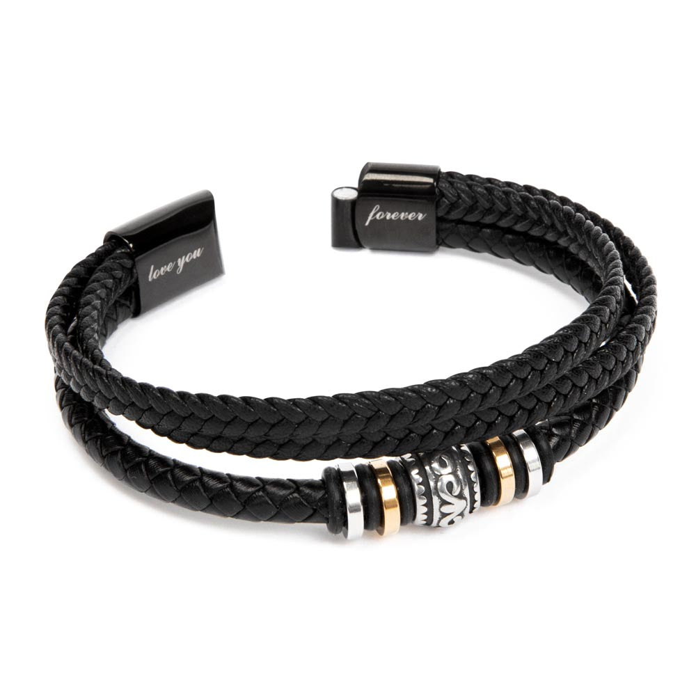 Black braided leather bracelet with engraved center and gold bead accents.