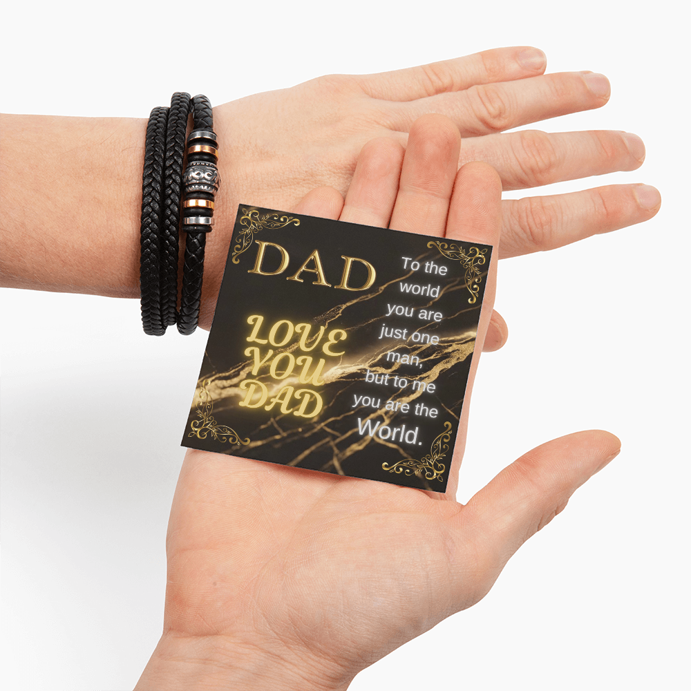 Black braided bracelet on hand with gold message gift card