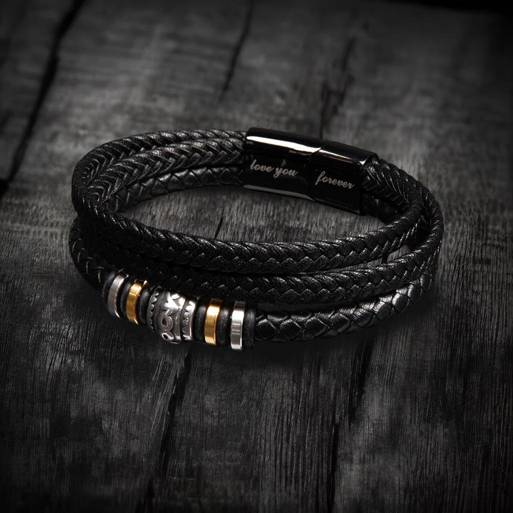 Black braided leather bracelet with “love you” strap and gold-tone accent beads.