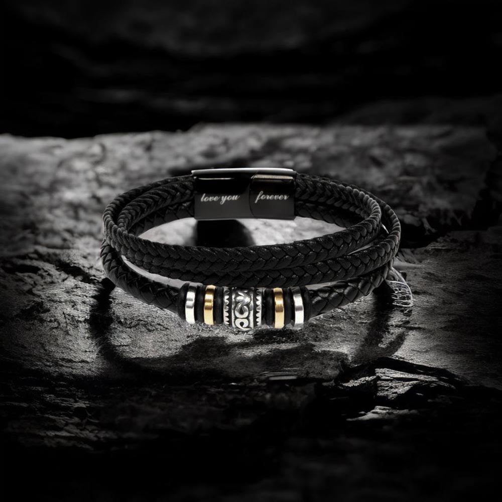Black braided bracelet with magnetic clasp and metal bead accents