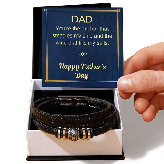 Black braided leather bracelet with silver and gold bead accents, magnetic clasp