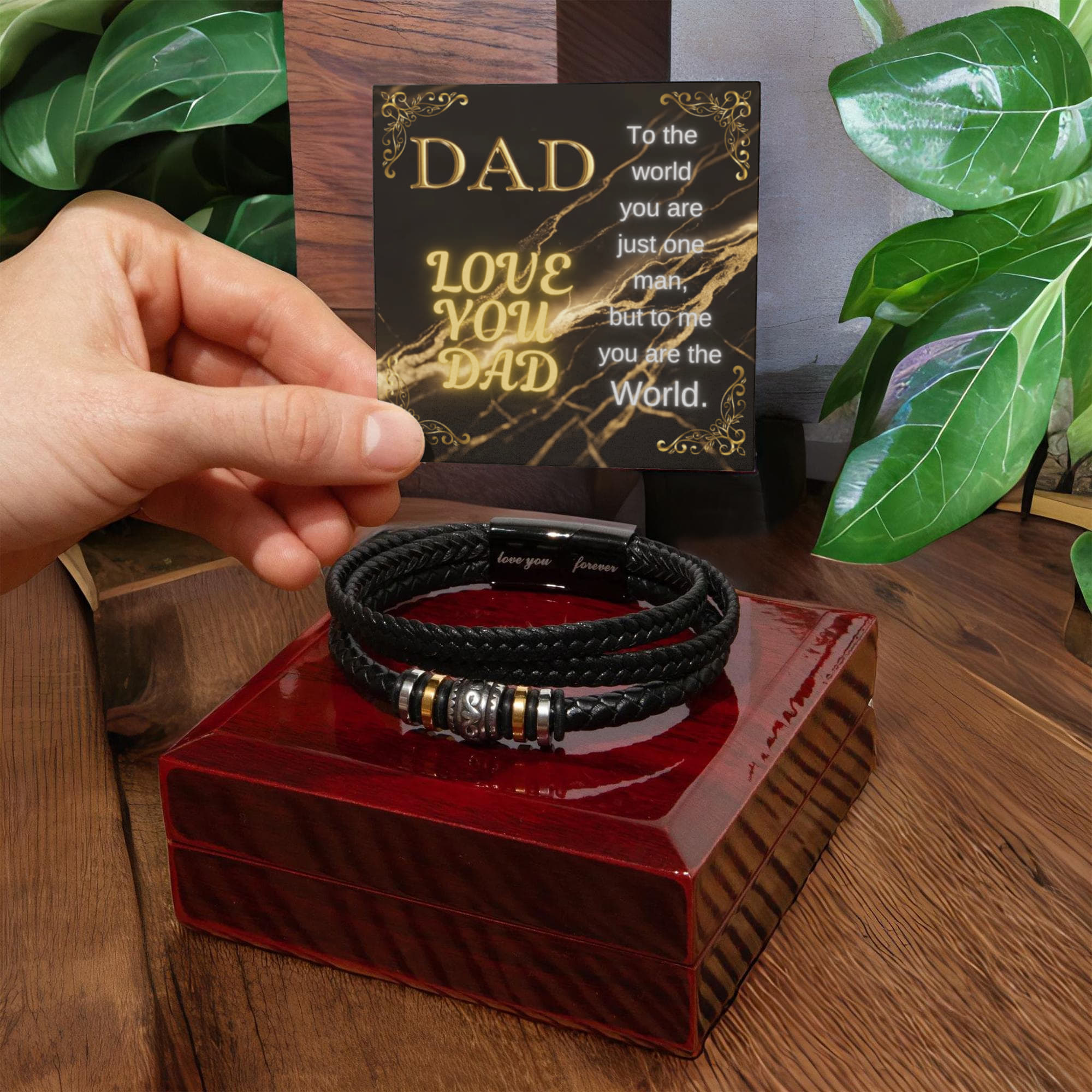 Black braided bracelet with bead accents, in red gift box with card