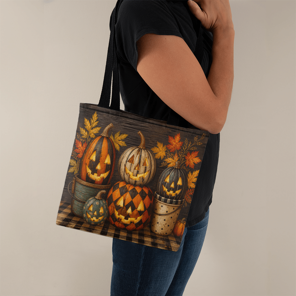 Halloween canvas tote bag with black handles and pumpkin autumn print