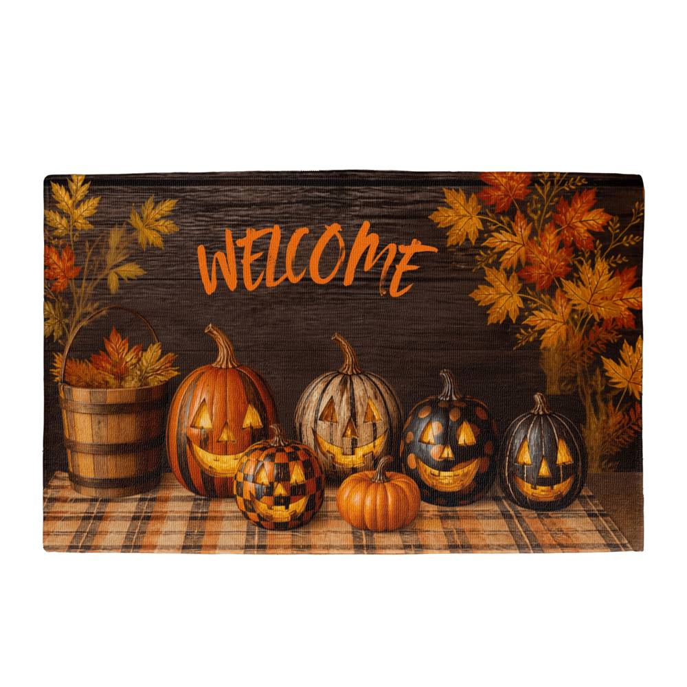 Halloween welcome doormat with pumpkins, jack-o'-lanterns, and autumn leaves on dark fabric