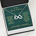 Open green gift card box with heart infinity pendant necklace inside.