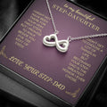 Silver-tone infinity heart pendant necklace on purple gift card, with chain links visible