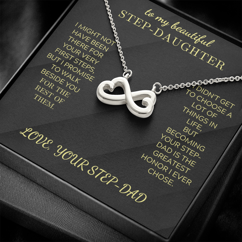 Silver heart-infinity pendant necklace on black velvet gift box insert
