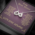 Silver heart-and-infinity pendant necklace on purple gift box insert
