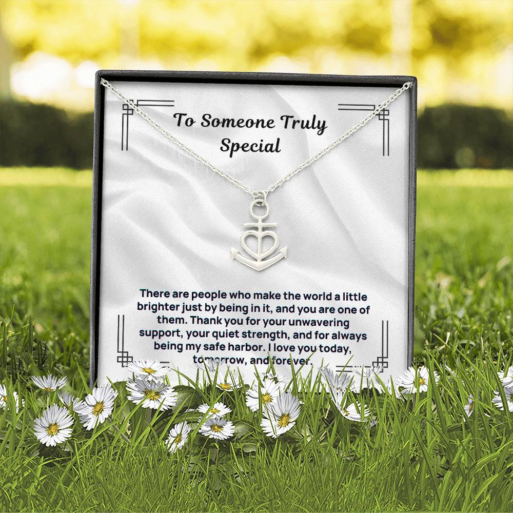 Silver anchor heart pendant necklace on display card inside a gift box