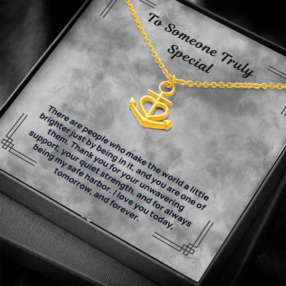 Gold-tone anchor and heart pendant necklace with chain