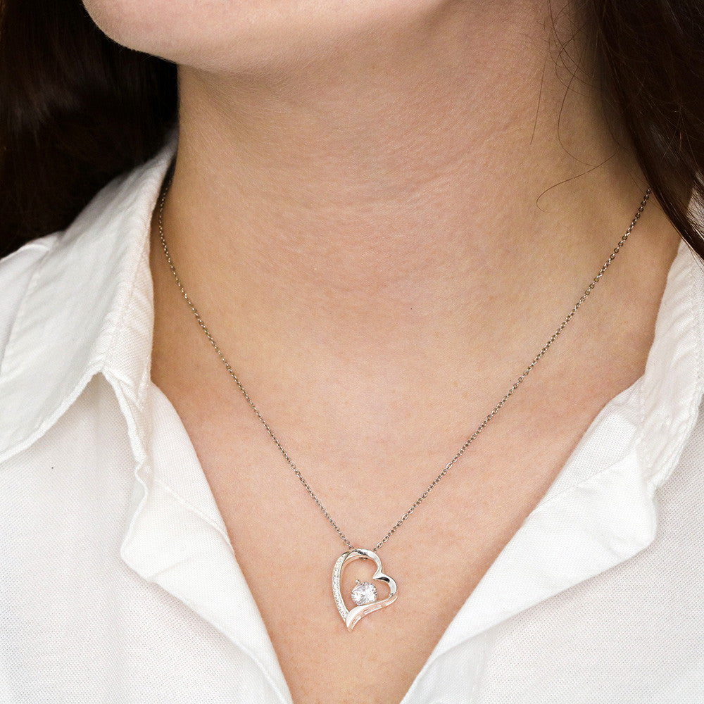 Silver-tone heart pendant necklace with round CZ on chain