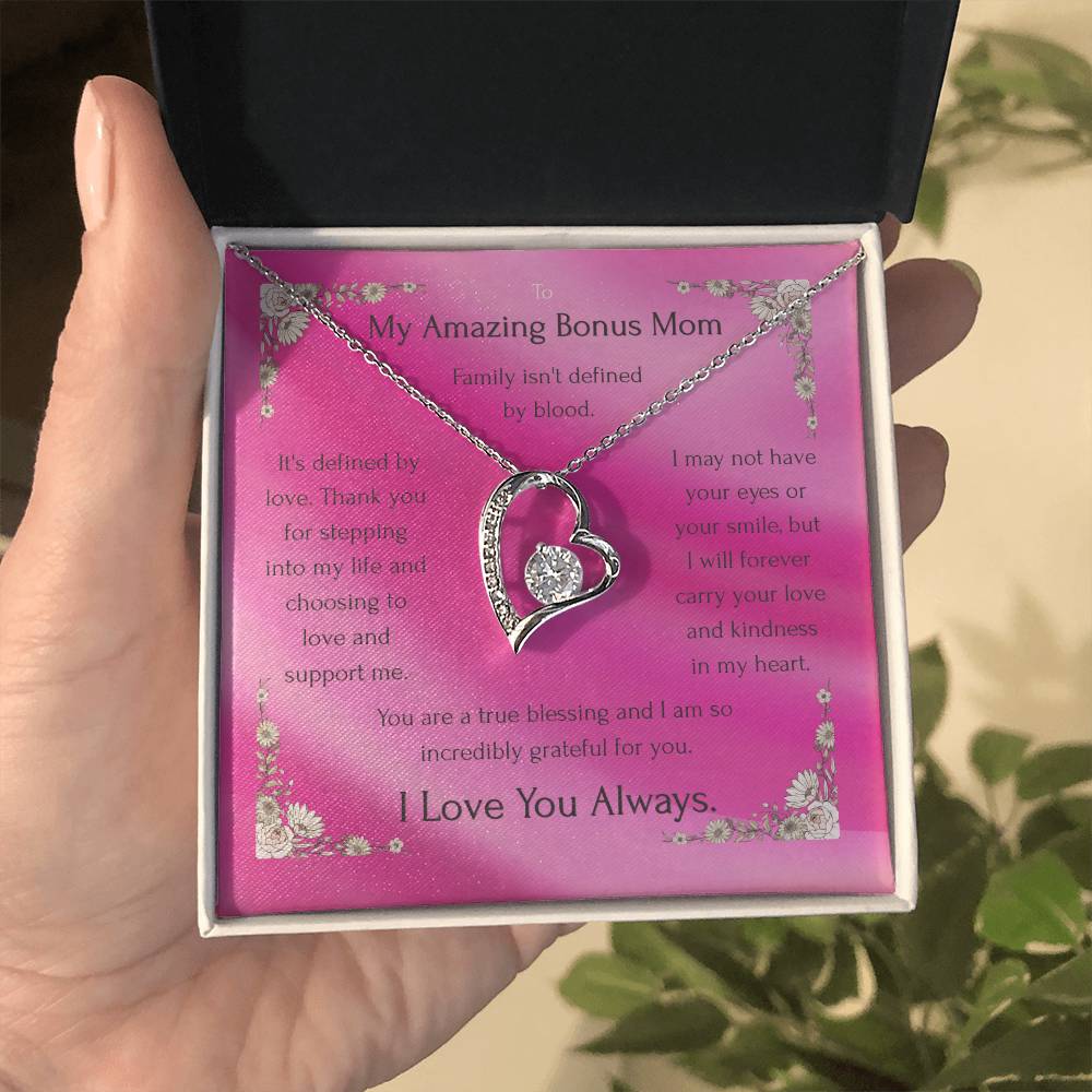 Heart pendant necklace in silver tone on a pink gift box with message card backing
