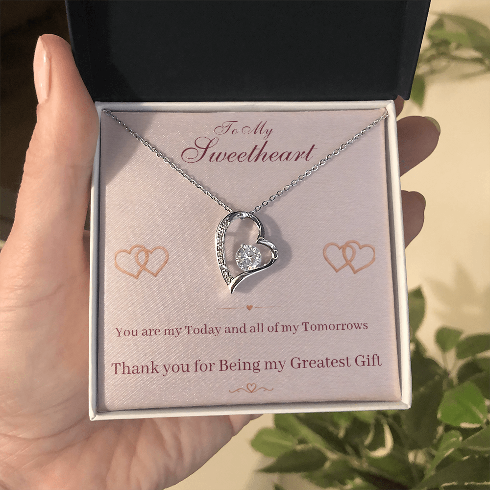 Heart pendant necklace with silver chain and sparkling heart in gift box with card