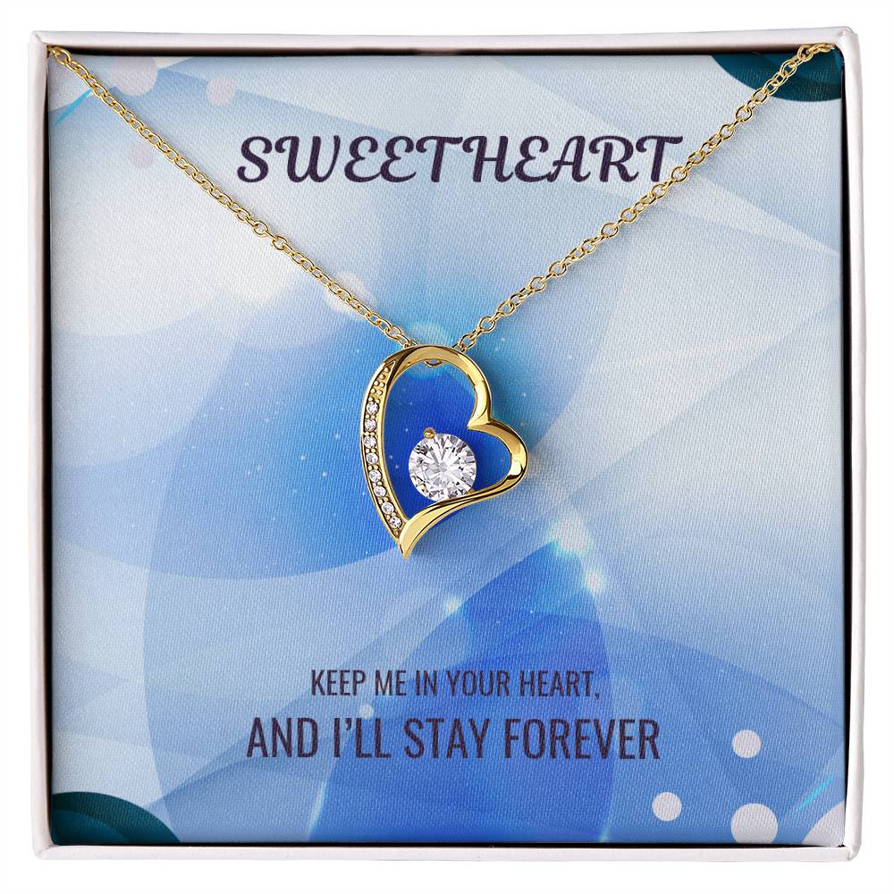 Gold-tone heart pendant necklace in gift box with clear sparkling heart pendant