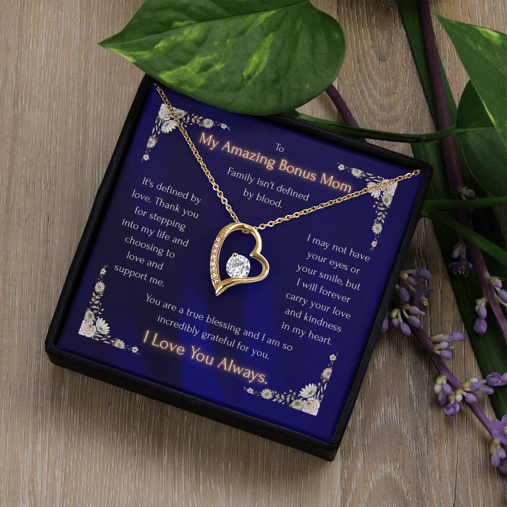 Blue heart pendant necklace in a gift box, gold-toned and crystal heart pendant