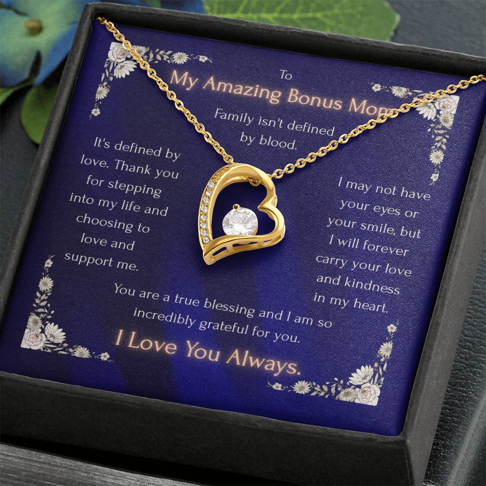 Blue heart pendant necklace in a black gift box, gold-toned heart with crystal details