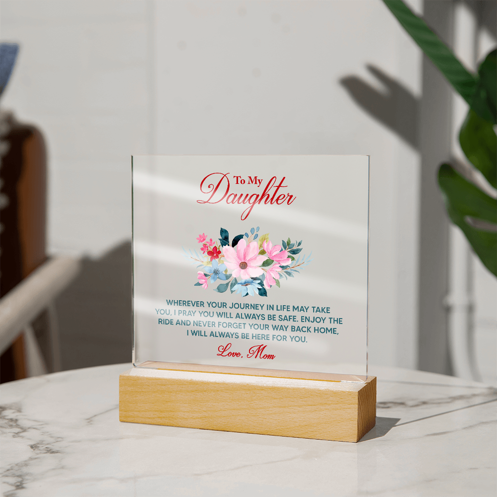 Acrylic keepsake sign with floral print, standing on light wooden base