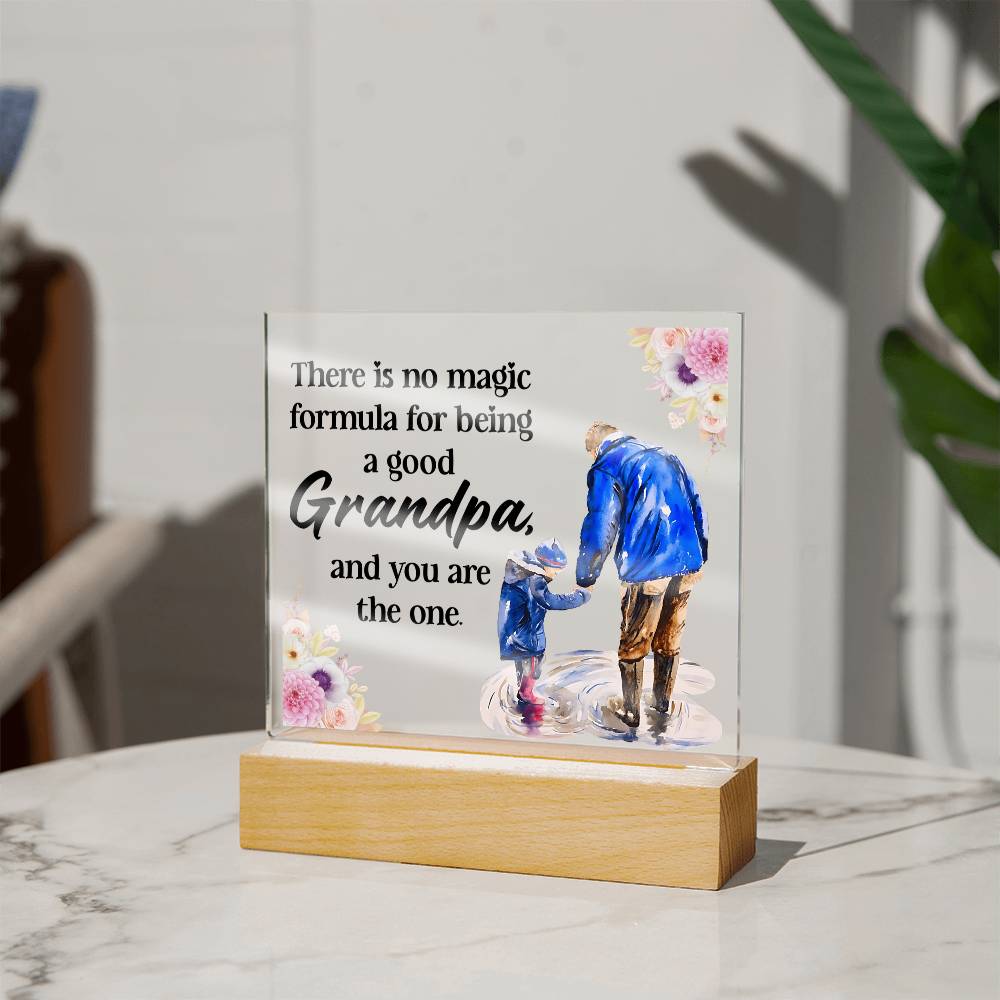 Acrylic square night light with blue grandfather figure and floral quote on wood base.
