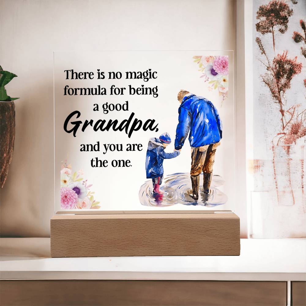 Acrylic square night light with blue grandfather figure and floral quote on wood base.