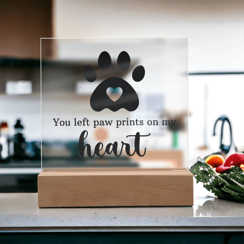 Clear acrylic keepsake with paw-print heart design and wooden base