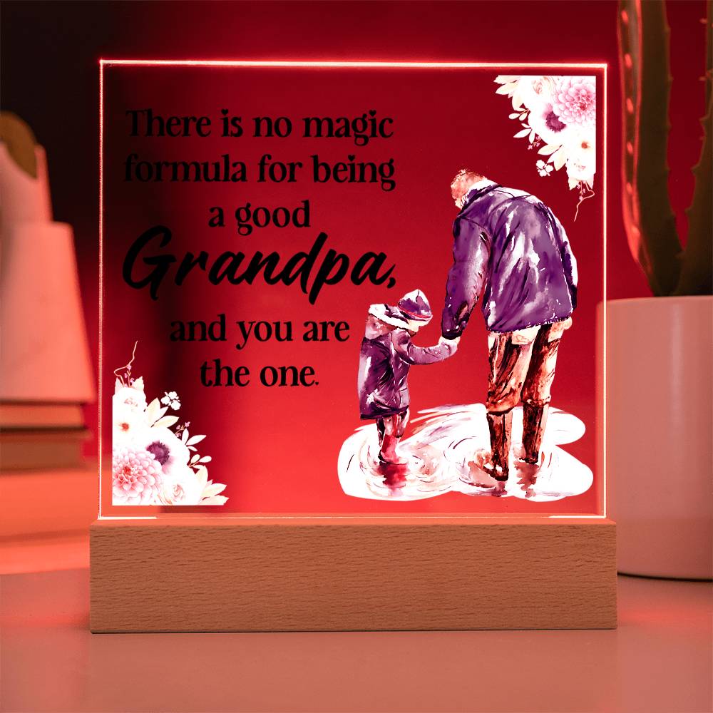 Acrylic square night light with blue grandfather figure, floral quote, red LED border, wood base.