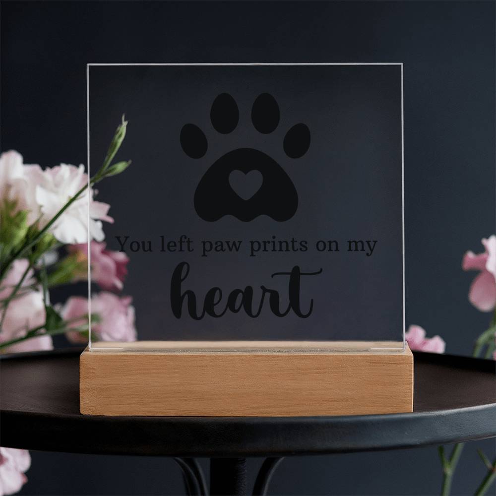 Clear acrylic keepsake with paw-print heart design and wooden base