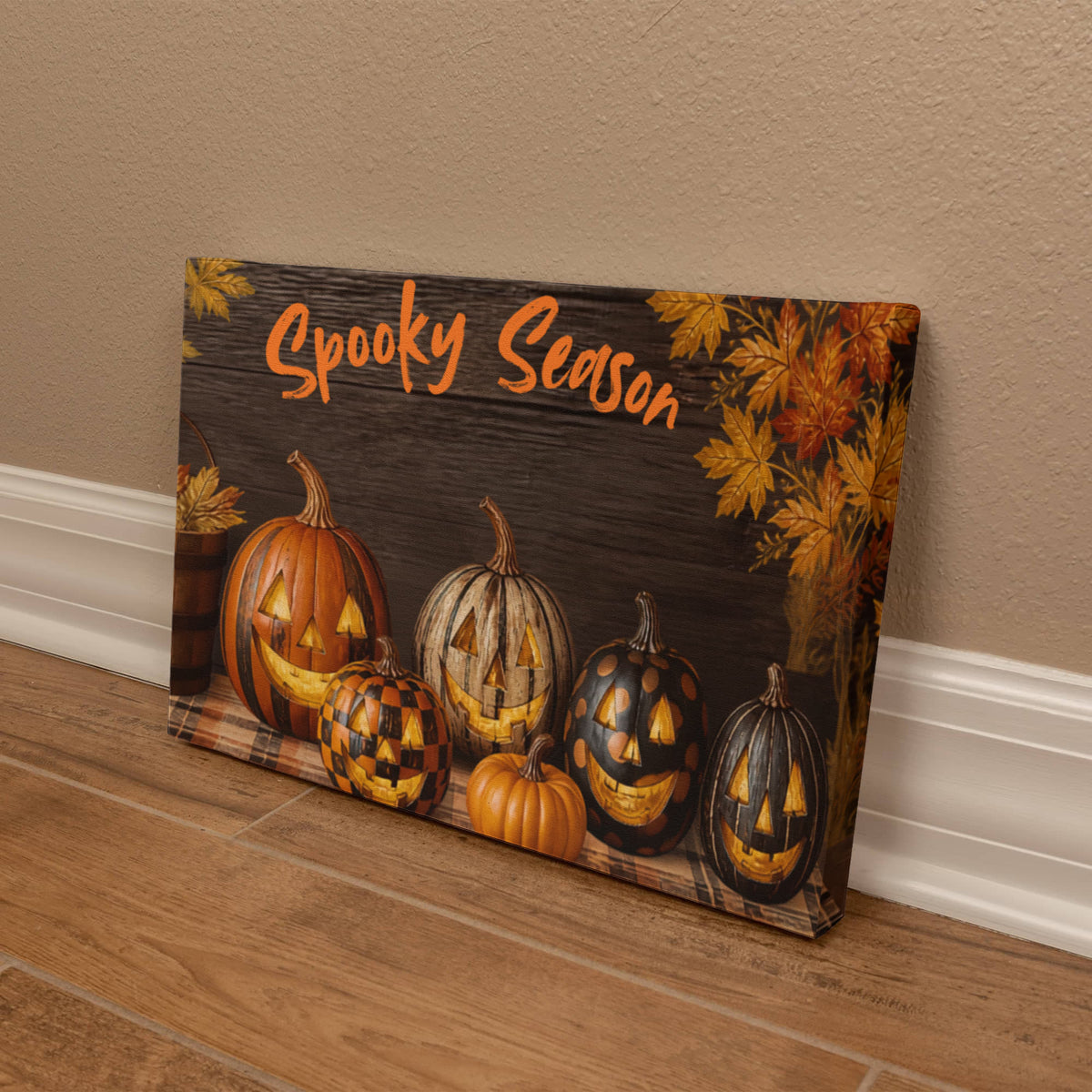 Horizontal Halloween canvas print with “Spooky Season” lettering, pumpkins, and fall leaves border.