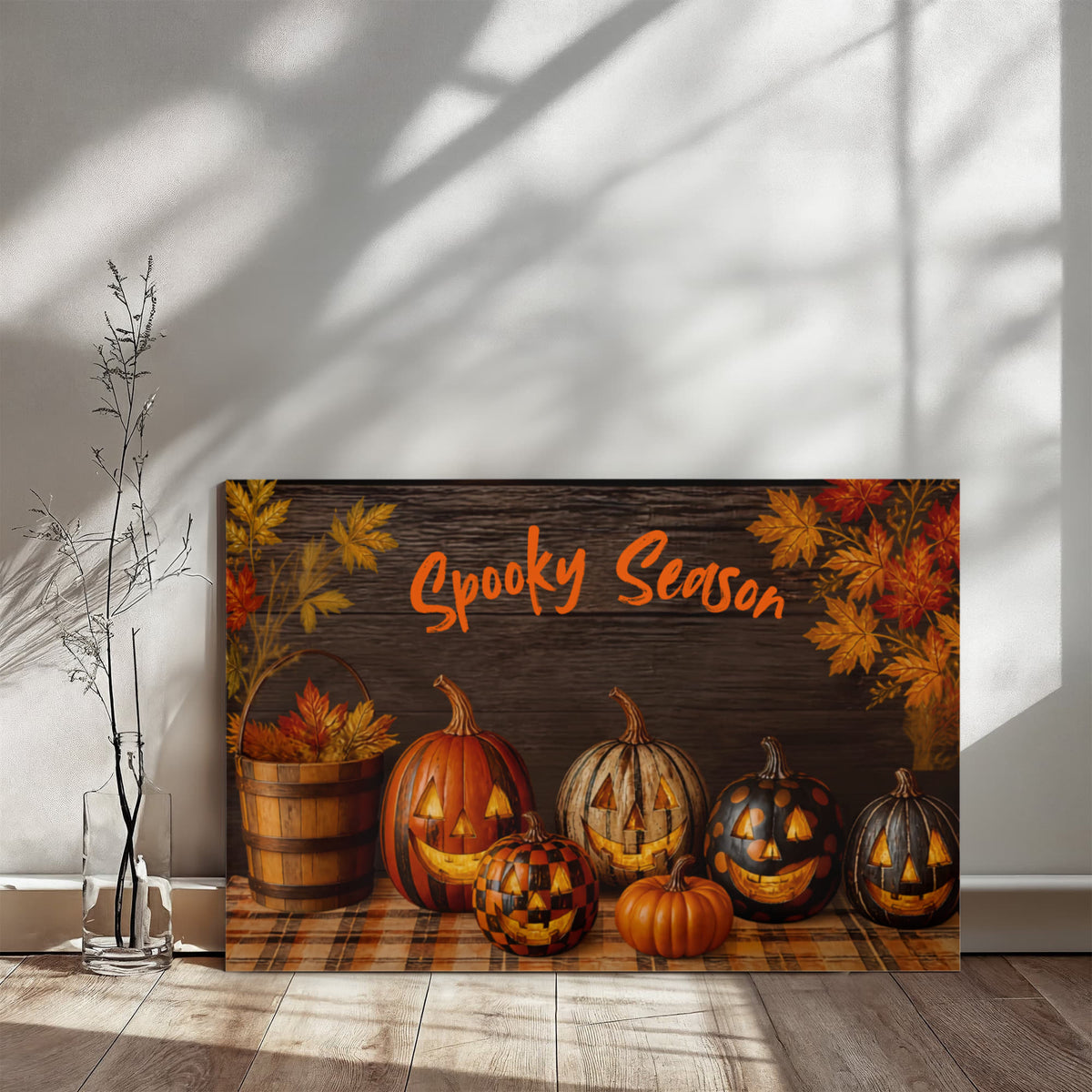 Halloween pumpkin canvas print with orange “Spooky Season” text and jack-o’-lanterns