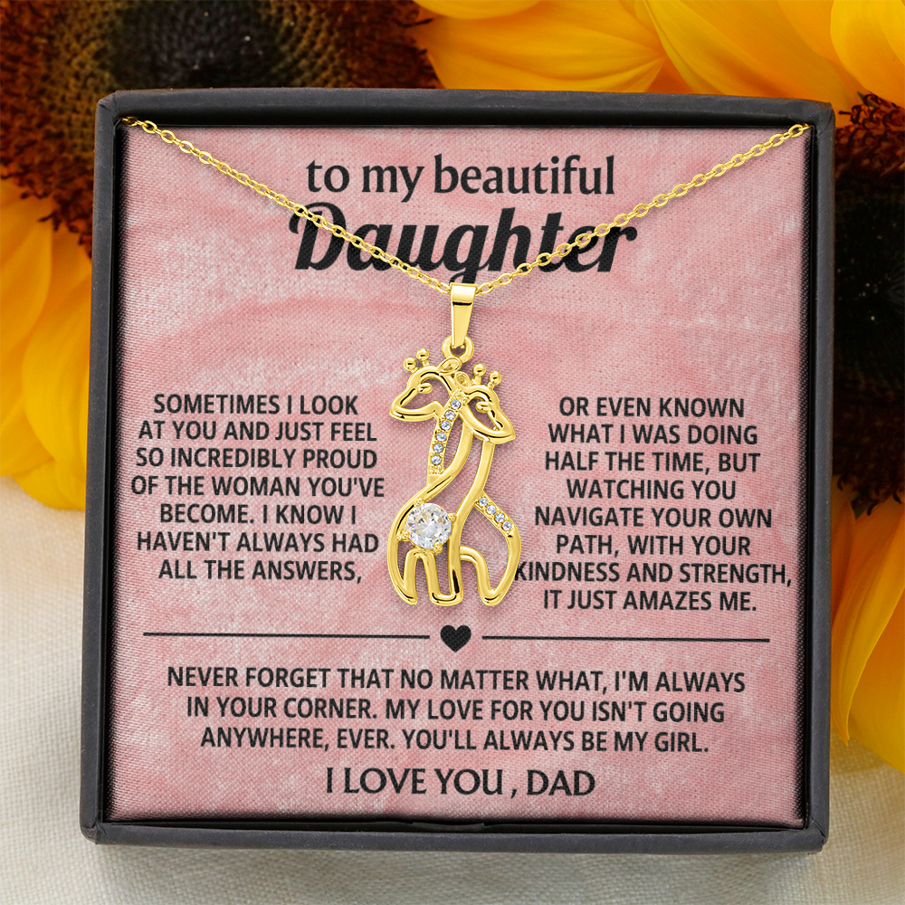 Gold-toned chain necklace in gift box with giraffe pendant and message card