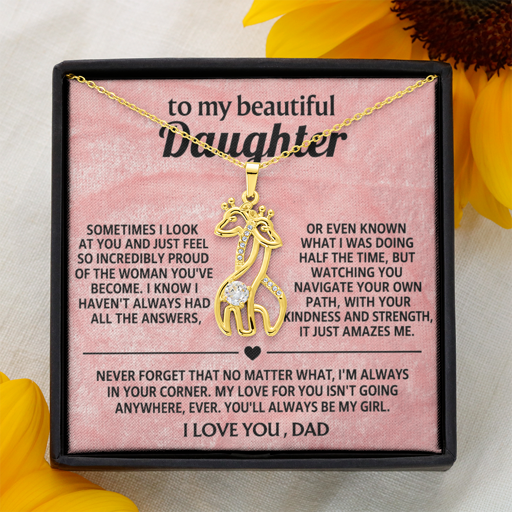 Gold-toned giraffe pendant necklace in gift box with message card